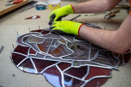 Ivanhoé, certissage au plomb avec gants de protection